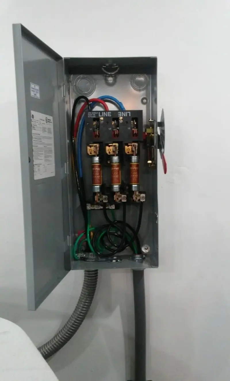 Three-phase disconnect switch installed for Smoke Detector Installation in South Burlington